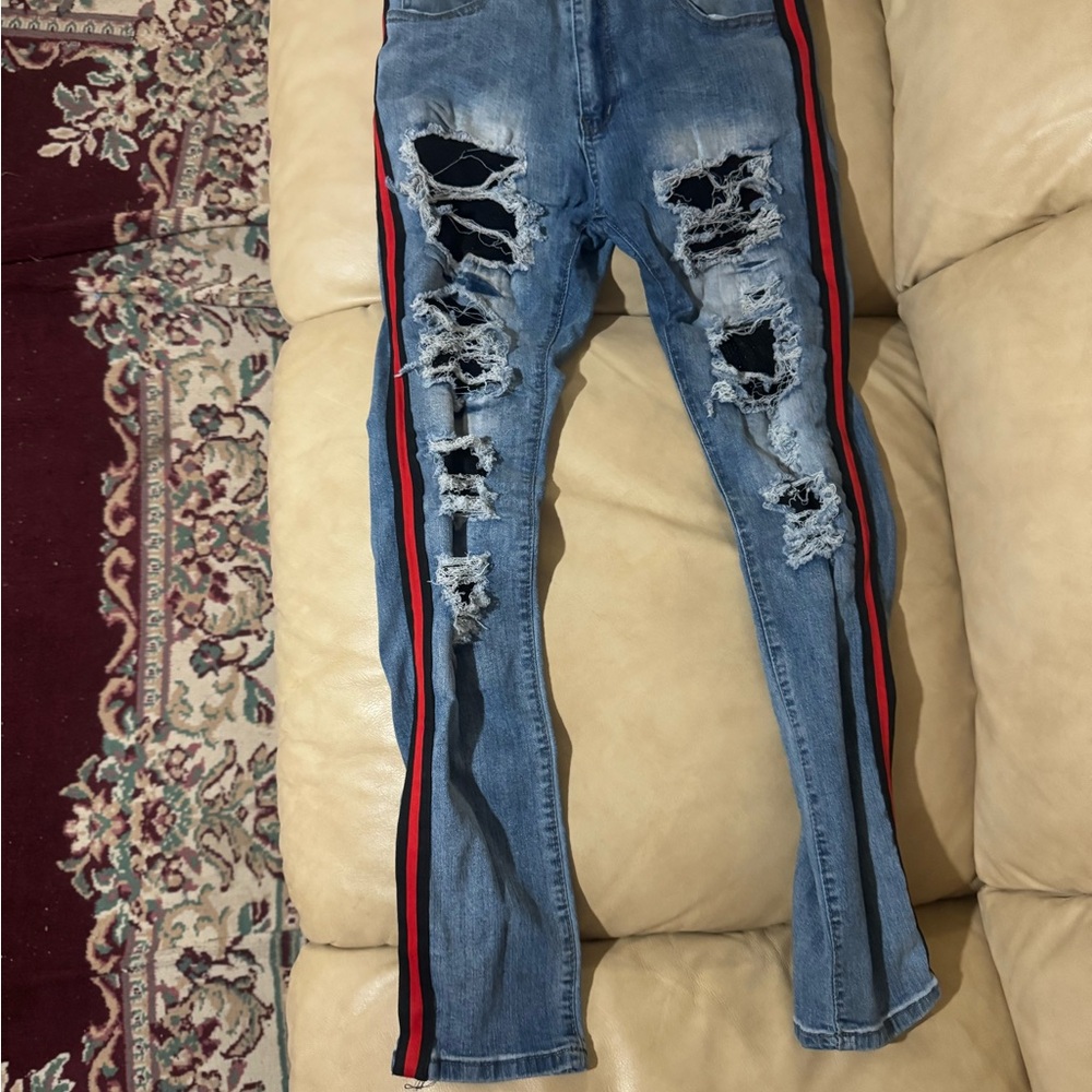 Stylish Distressed Skinny Jeans with Red Stripe